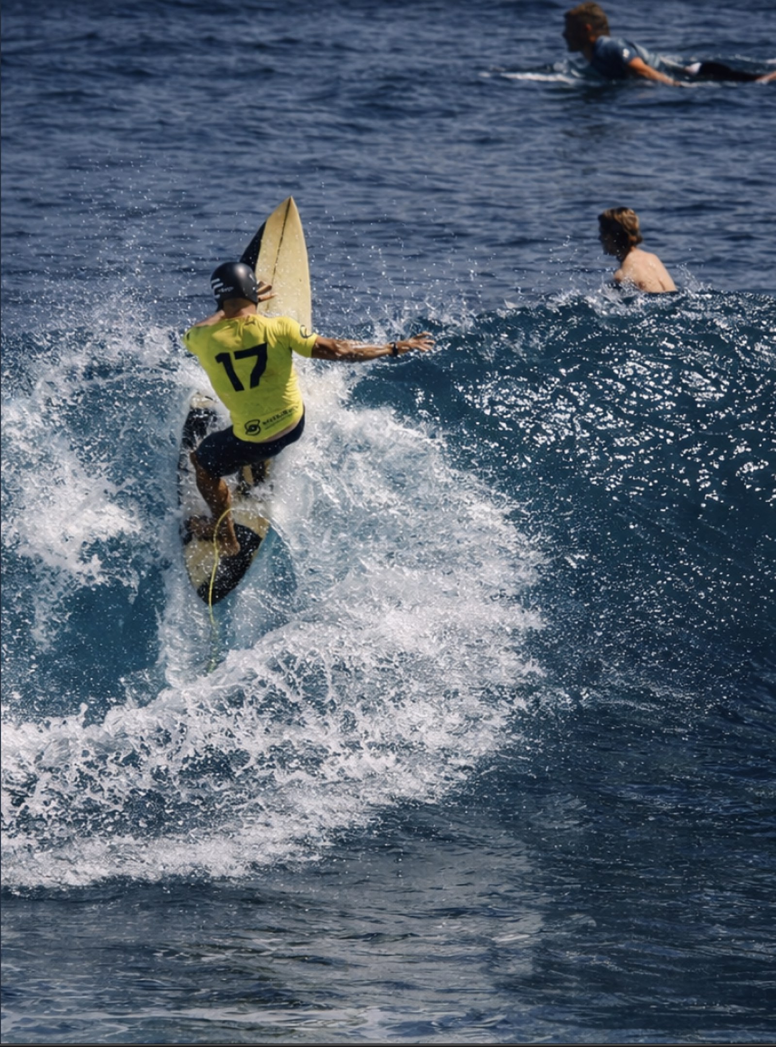 A student surfing during the Wisdom Academy surf performance program